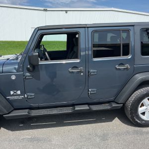 JEEP WRANGLER UNLIMITED X - 4
