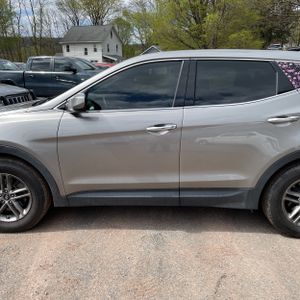 HYUNDAI SANTA FE SPORT 2.4L - 4