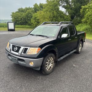 2010 Nissan FRONTIER LE 照片 1