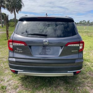HONDA PILOT TOURING W/REAR CAPTAIN'S CHAIRS - 7