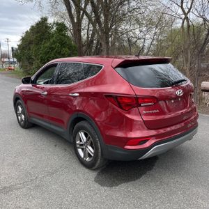 HYUNDAI SANTA FE SPORT 2.4L - 4
