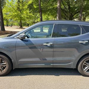 HYUNDAI SANTA FE SPORT 2.4L - 4