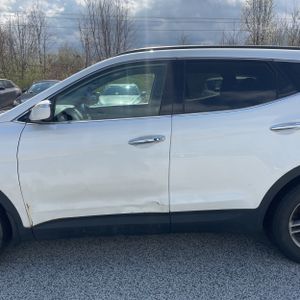 HYUNDAI SANTA FE SPORT 2.4L - 4