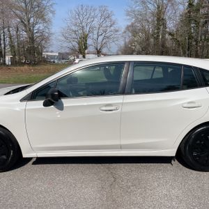 SUBARU IMPREZA 2.0I - 4