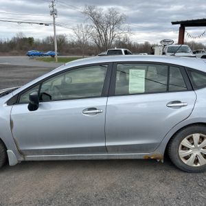 SUBARU IMPREZA 2.0I - 4