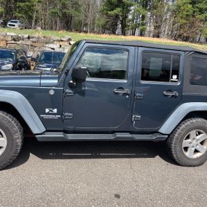 JEEP WRANGLER UNLIMITED X - 4