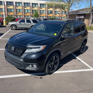 HONDA PASSPORT TOURING - 1