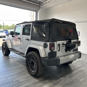 2011 JEEP WRANGLER UNLIMITED SAHARA — фото 4