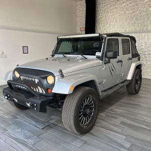 2011 JEEP WRANGLER UNLIMITED SAHARA — фото 1