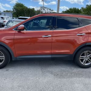 HYUNDAI SANTA FE SPORT 2.4L - 4