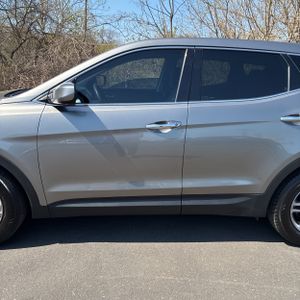 HYUNDAI SANTA FE SPORT 2.4L - 4