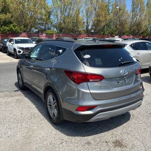 HYUNDAI SANTA FE SPORT 2.4L - 4
