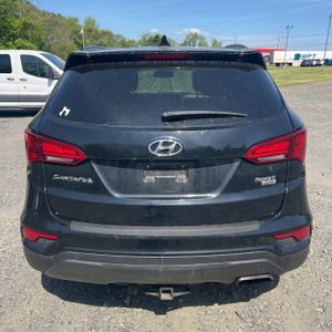 HYUNDAI SANTA FE SPORT 2.4L - 7