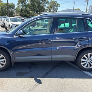 2011 Volkswagen TIGUAN S — фото 4