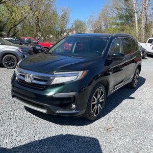 HONDA PILOT TOURING W/REAR CAPTAIN'S CHAIRS - 1