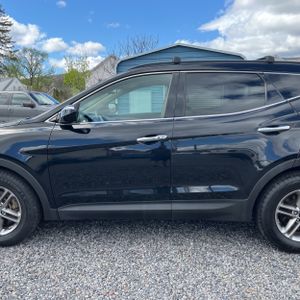 HYUNDAI SANTA FE SPORT 2.4L - 4